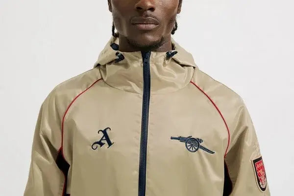 Veste coupe-vent rétro dorée d’Arsenal USA Jackets